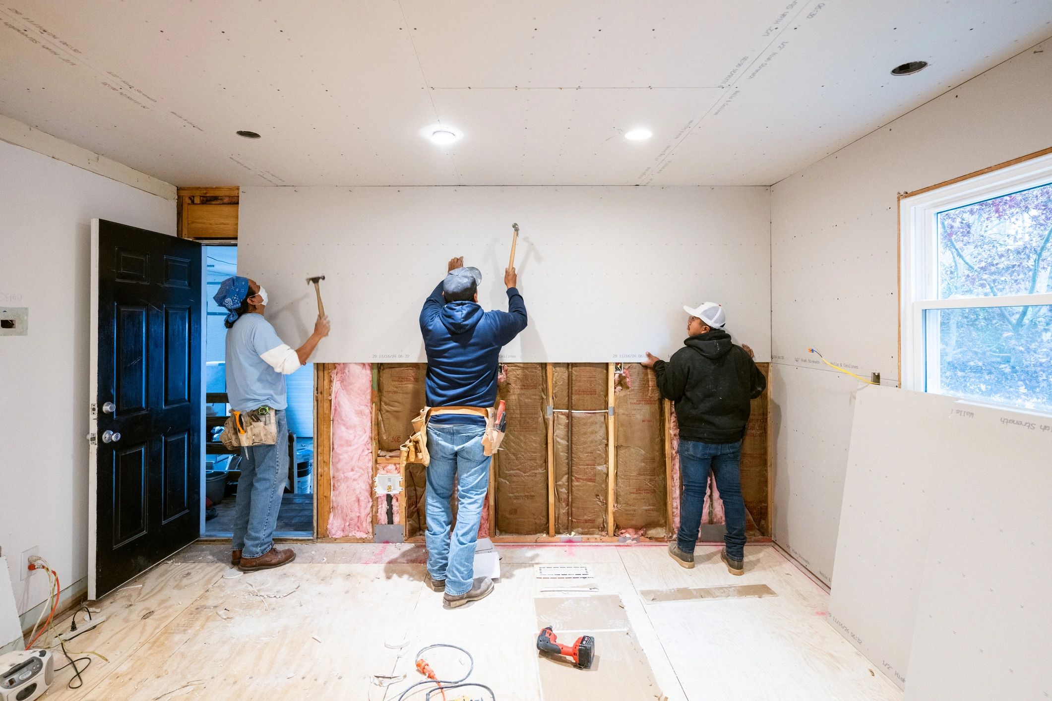 Construction crew working on an interior renovation